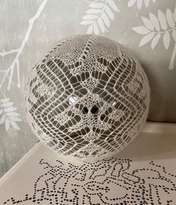 NEW - Shetland fine lace wool table lamp. Alice Maude pattern from the 1800s in Shetland white on smoked glass, reflects subtle pattern when lit. - Image